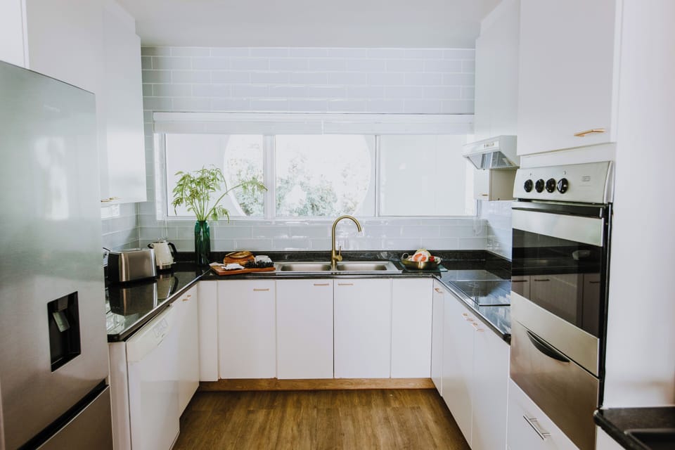 Apartment, 3 Bedrooms, Non Smoking | Private kitchen | Full-size fridge, microwave, oven, stovetop