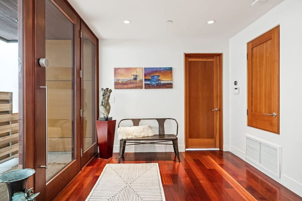 Entry through middle floor where Master Bedroom and one Guest Bedroom are located
