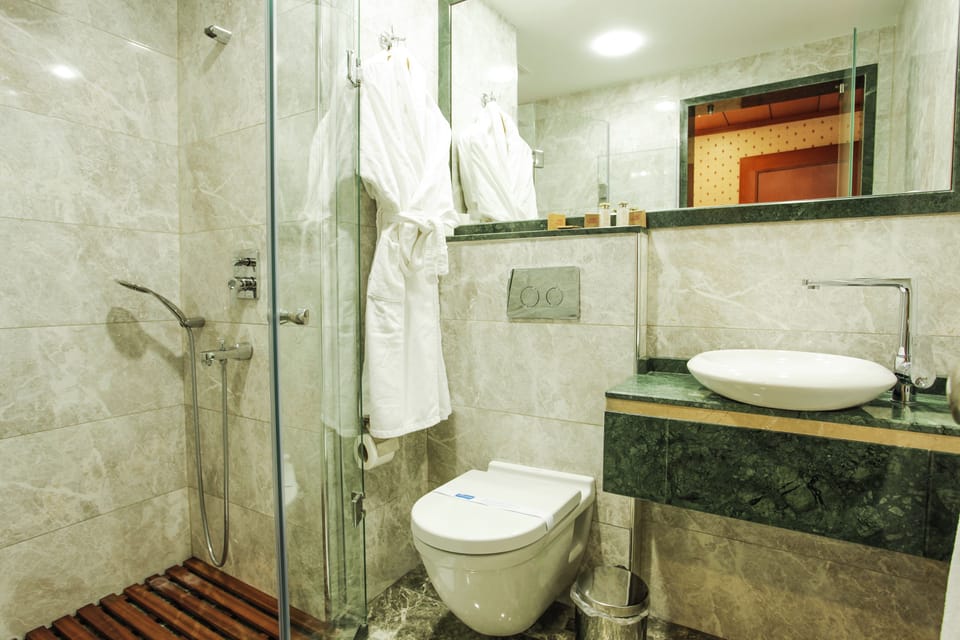 Free toiletries, hair dryer, slippers, towels