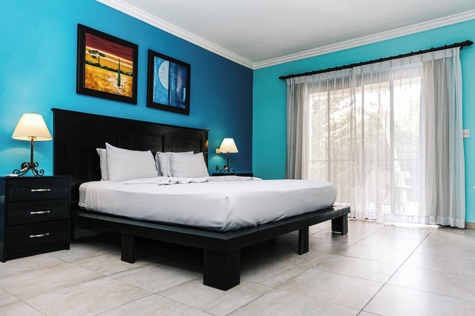 Deluxe Family Suite with Pool View | Garden view