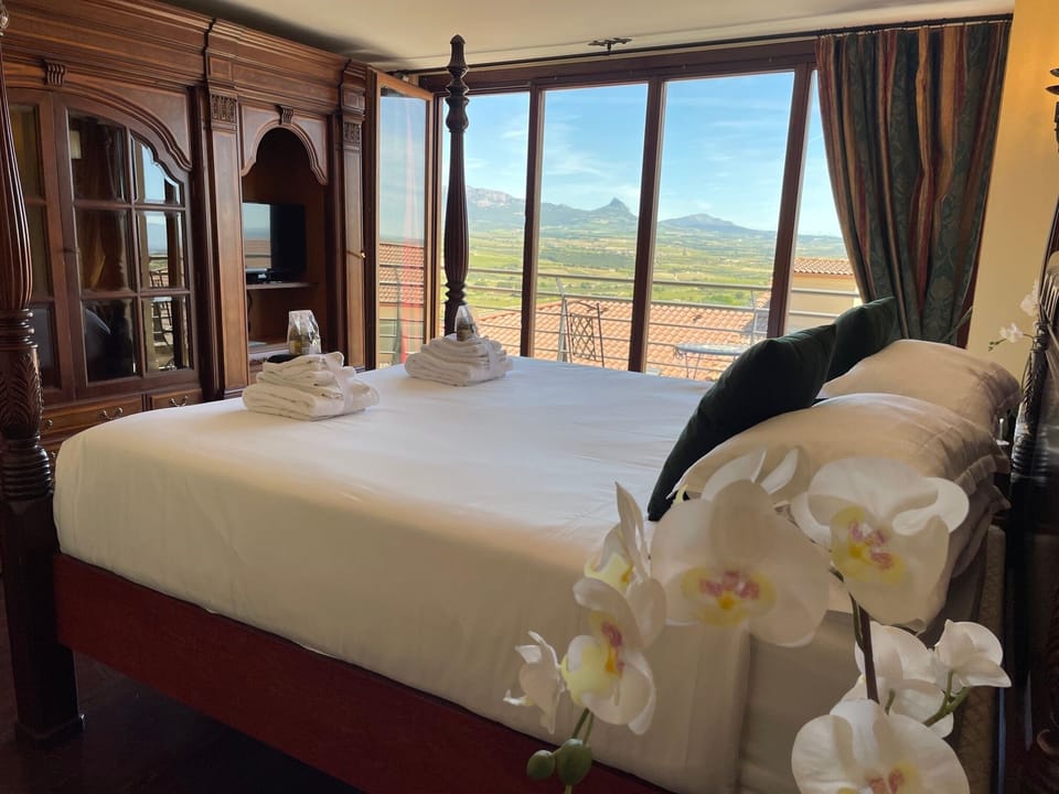 Romantic Room | Premium bedding, pillowtop beds, laptop workspace, blackout drapes