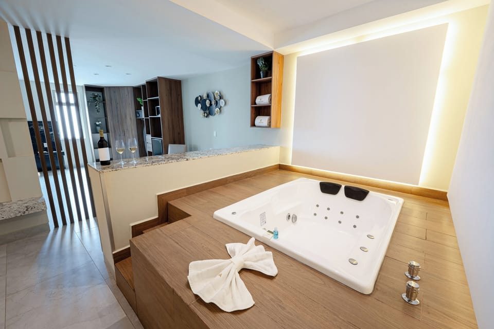 Grand Suite, 1 King Bed with Sofa bed, Jetted Tub, Poolside | Minibar, in-room safe, individually furnished, desk