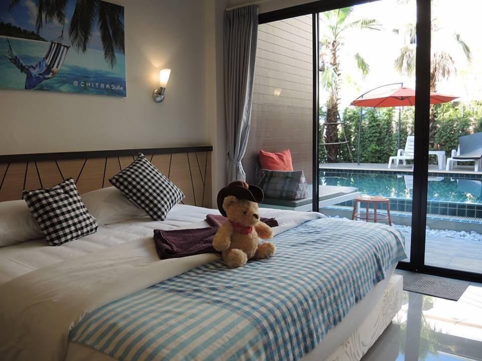 Deluxe Room, Pool Access | In-room safe, desk, blackout drapes, rollaway beds