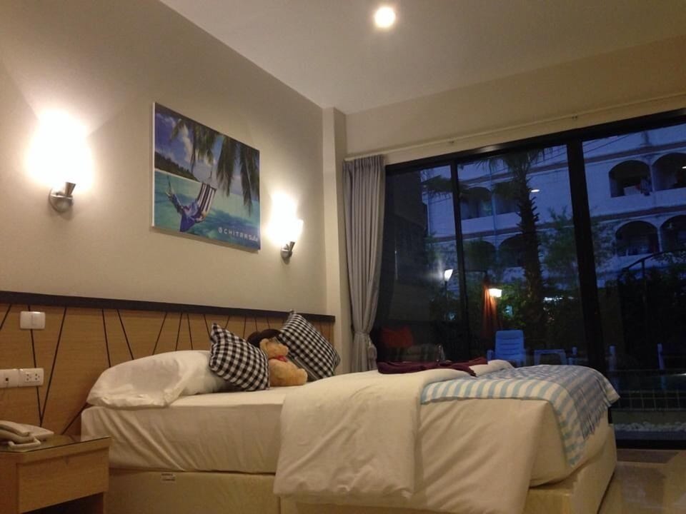 Deluxe Room, Pool Access | In-room safe, desk, blackout drapes, rollaway beds