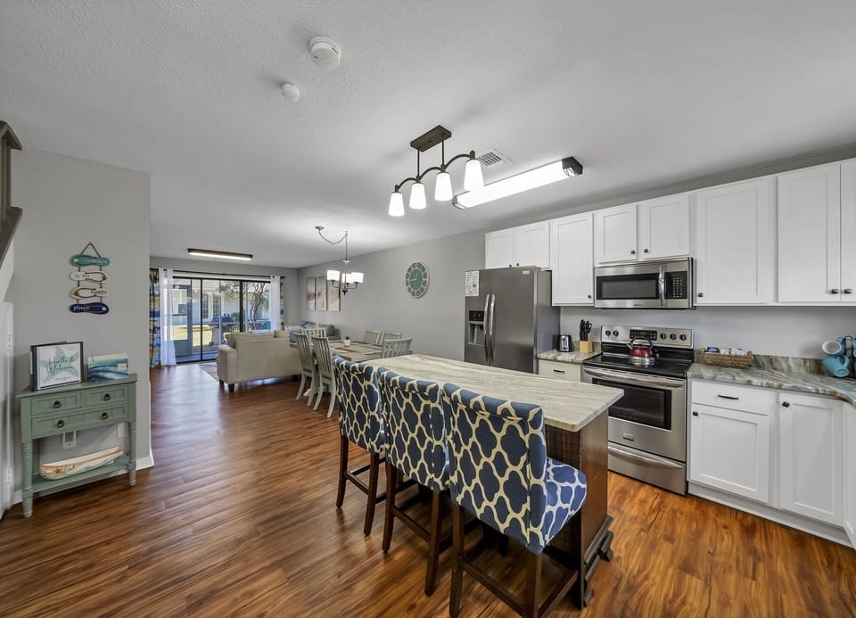 Spacious entertainment area with this open-concept floor plan