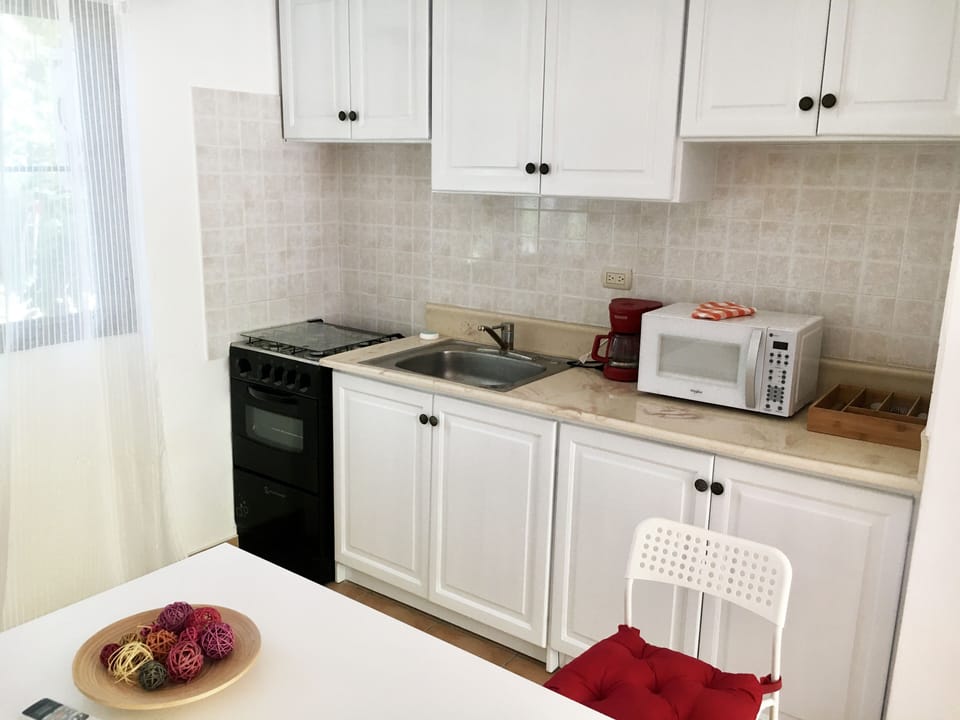 Family Apartment, 1 Bedroom, Pool View | Private kitchen | Fridge