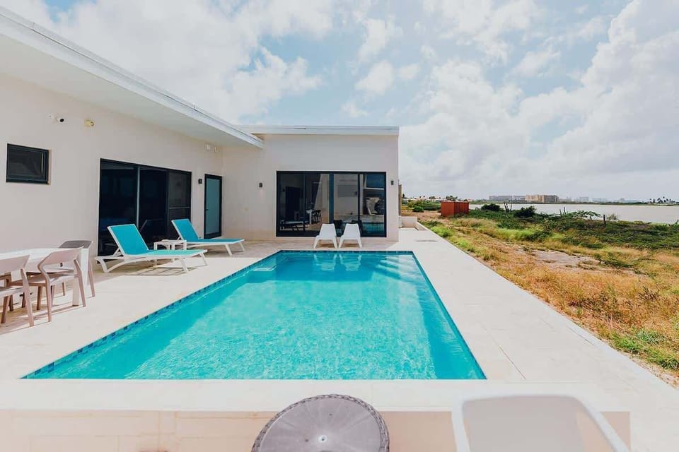 The dimensions of the pool are 4 meters by 7 meters, or roughly 13 feet by 23 feet. In addition to the dimensions, the Infinity effect pool with The View Sun loungers and outdoor dining area. Private and a large backyard with a VIEW, only for you! 