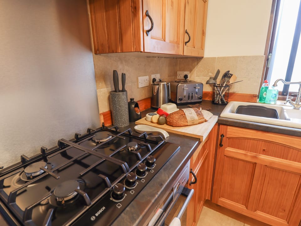 Fridge, electric kettle, toaster, cookware/dishes/utensils