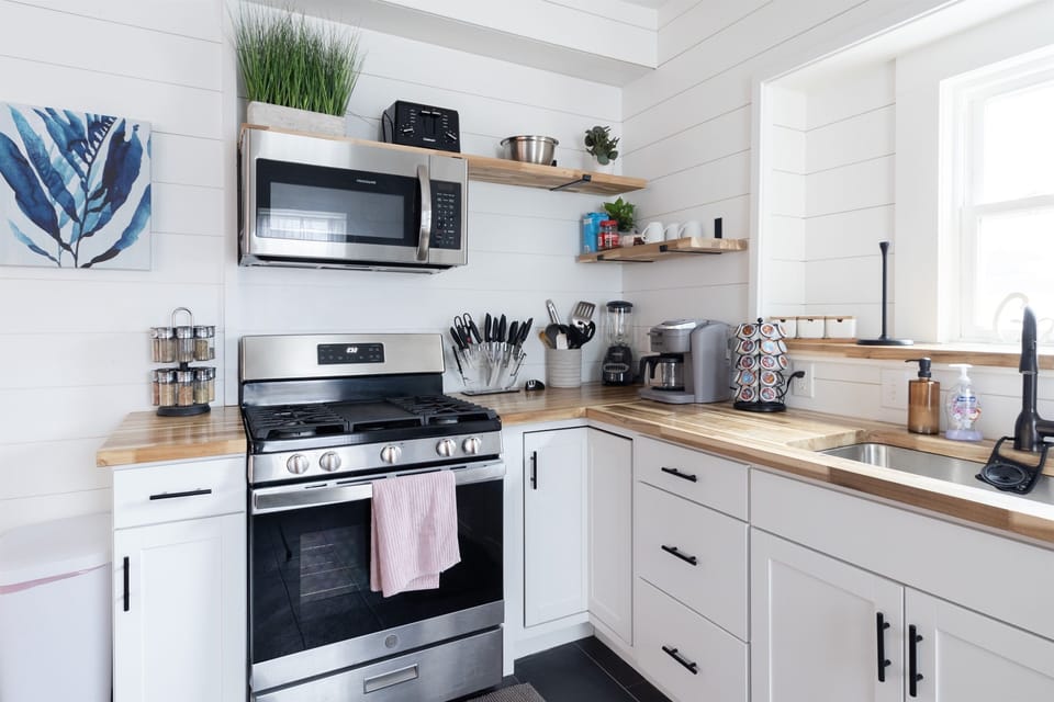 This kitchen has all the essentials and more, designed for ease and efficiency in cooking and entertaining.