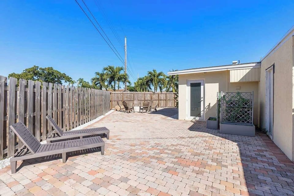 Soak in the sun rays in the privacy of the backyard
