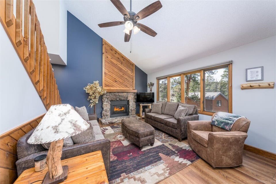 Warm & welcoming living room with gas fireplace and great views. New Furniture!!