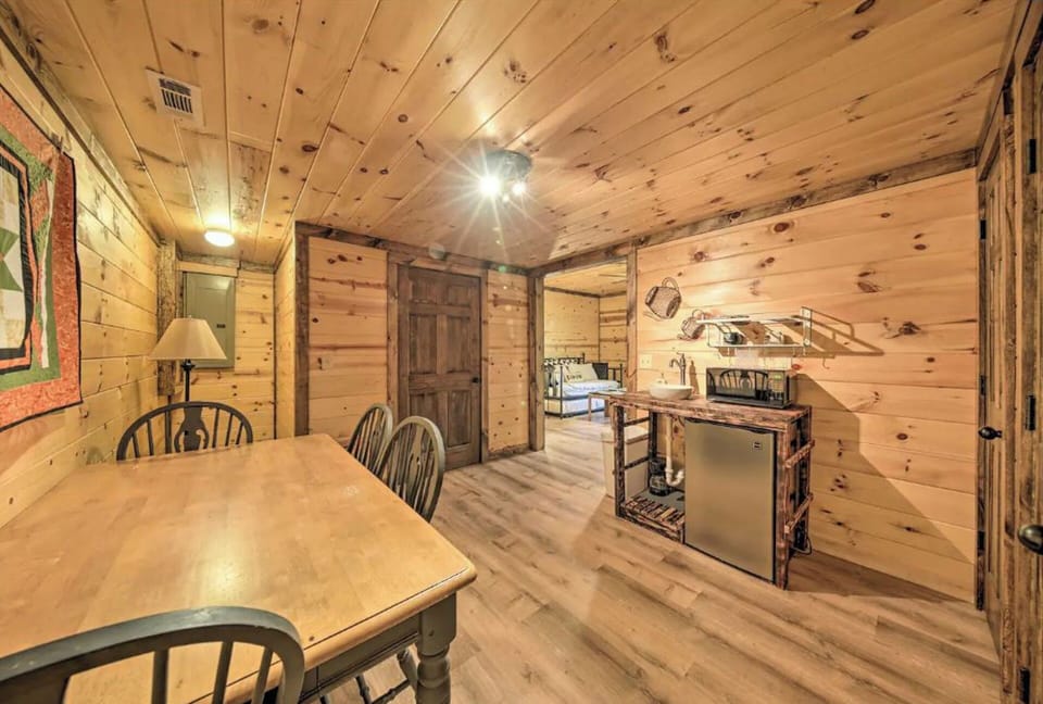 lower level additional dining space w/ wetbar with mini fridge and microwave