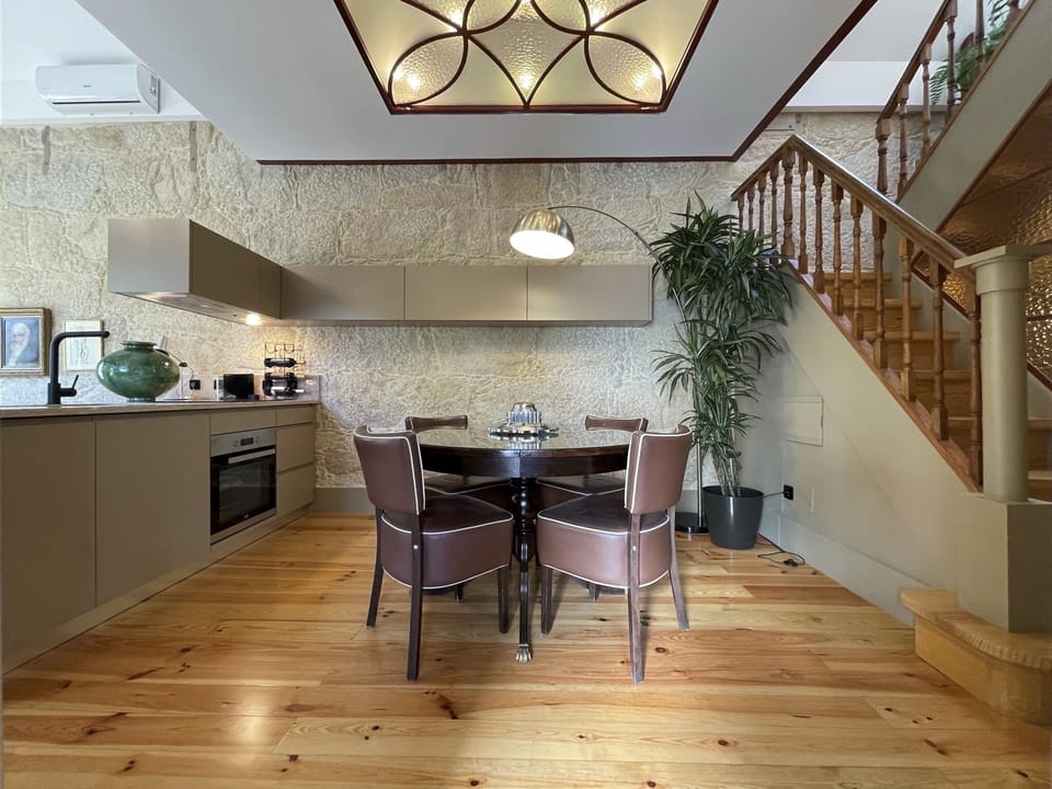 Dining area and access stairs to the upper floor in the attic