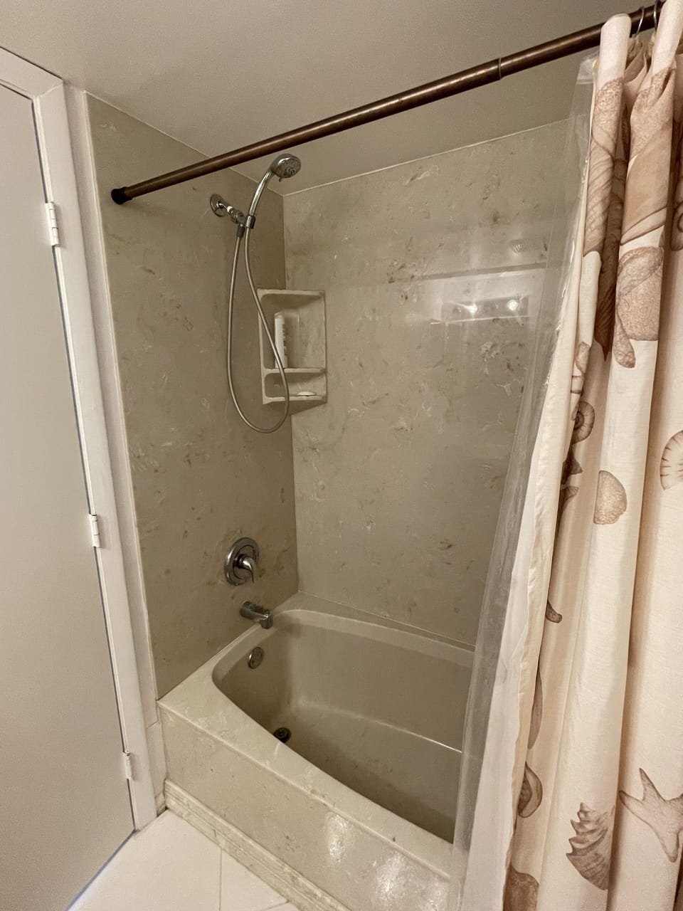 Second bathroom with bathtub and shower