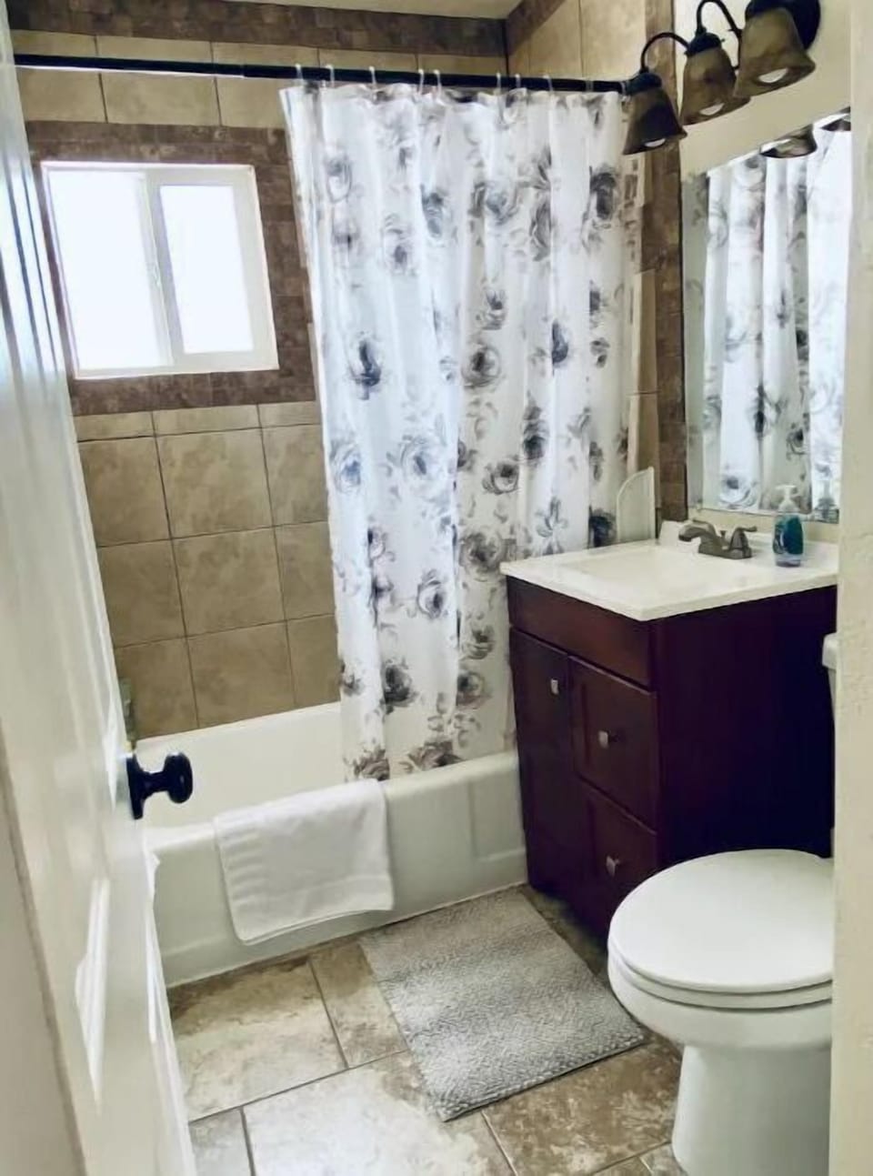 Tub/Shower, handheld shower, Towels, soap, conditioner, toilet paper