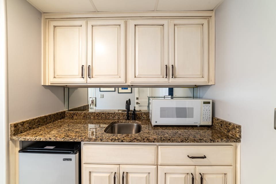 Your mother in law suite has a mini-kitchen and a separate entry.