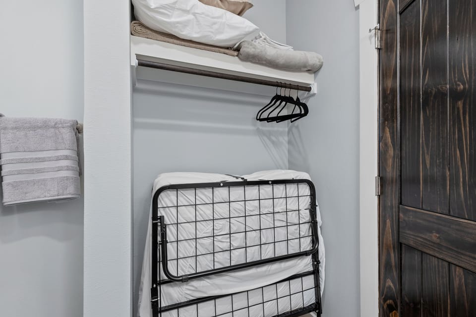 Both upper-level bedrooms have a single roll away bed. 