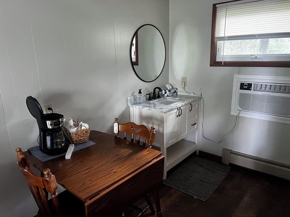 Dining table extends to seat 4
A/C unit in each room