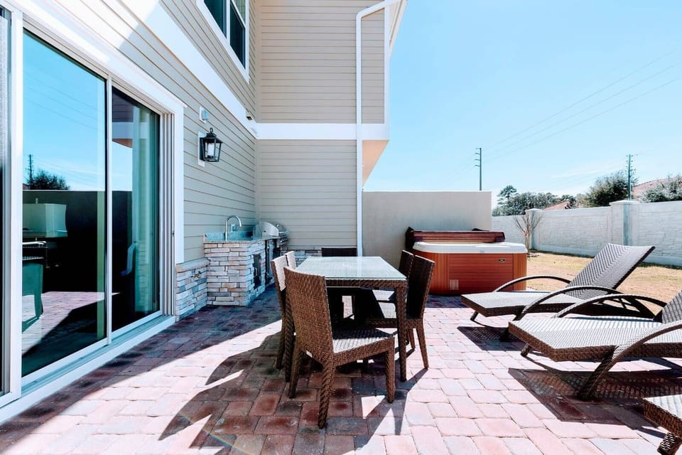 Step onto the patio, where comfortable furniture and sun loungers await you, alongside a summer kitchen for al fresco dining and a jacuzzi for ultimate relaxation