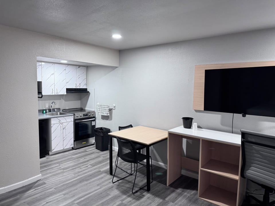 Room, 2 Queen Beds, Non Smoking, Kitchenette | Iron/ironing board, WiFi (free), bed sheets