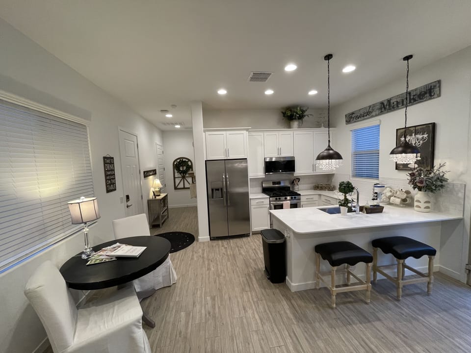 Dinning table and chairs, kitchen, island bar seating
