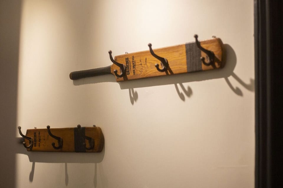 Cricket bat coat hangers