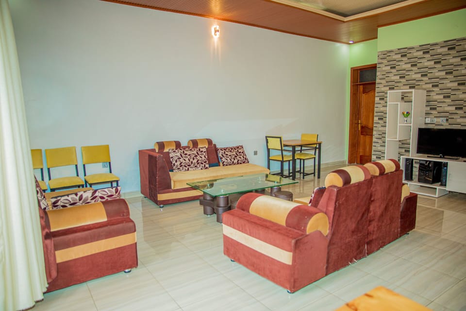 Comfort Double Room | Living area | 64-inch Smart TV with cable channels, TV