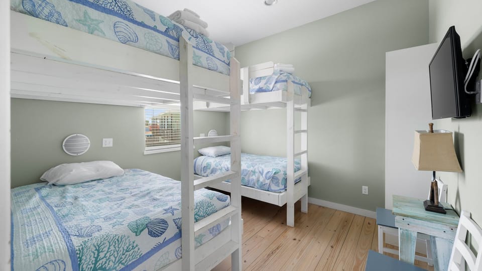 Bunk Room — Two Sets of Bunk Beds with Coastal Bedding & TV