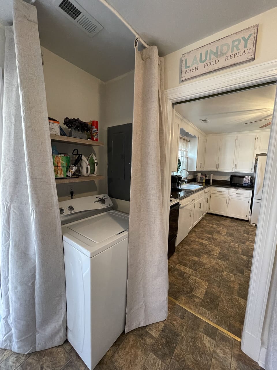 Laundry room has washer and dryer