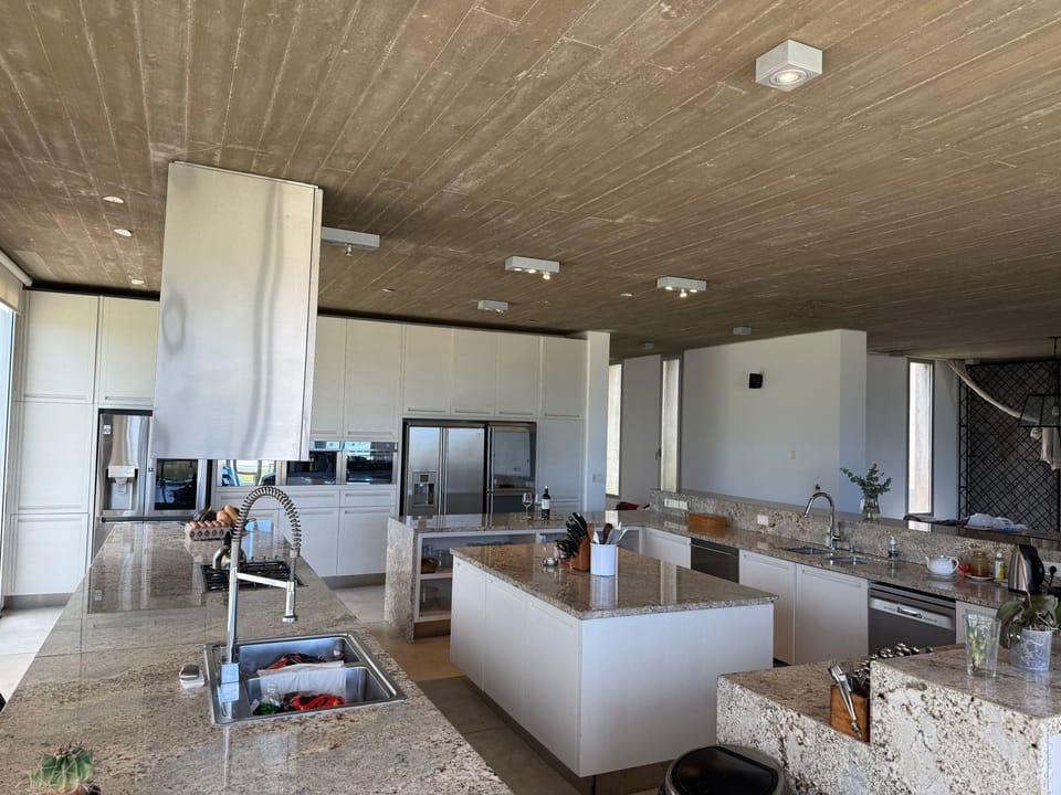 large spacious kitchen, two sinks, two dishwashers, island lots of counter space