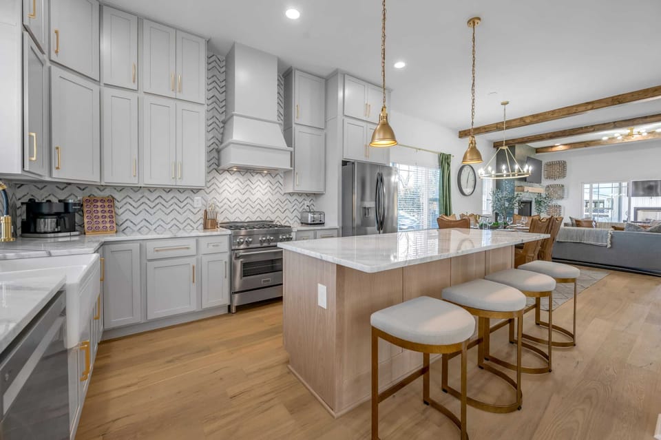 Cook like a chef in our fully stocked, high-end kitchen complete with top-of-the-line appliances and all the necessary cookware.