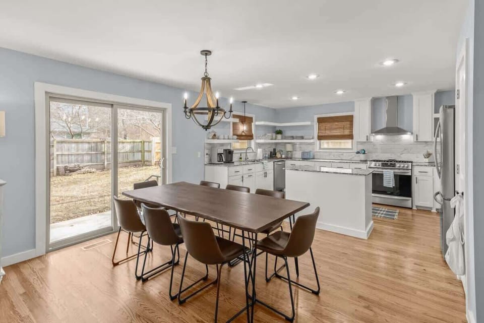 Stylish dining area: Eight‑seat dining table—great for shared meals & conversation.