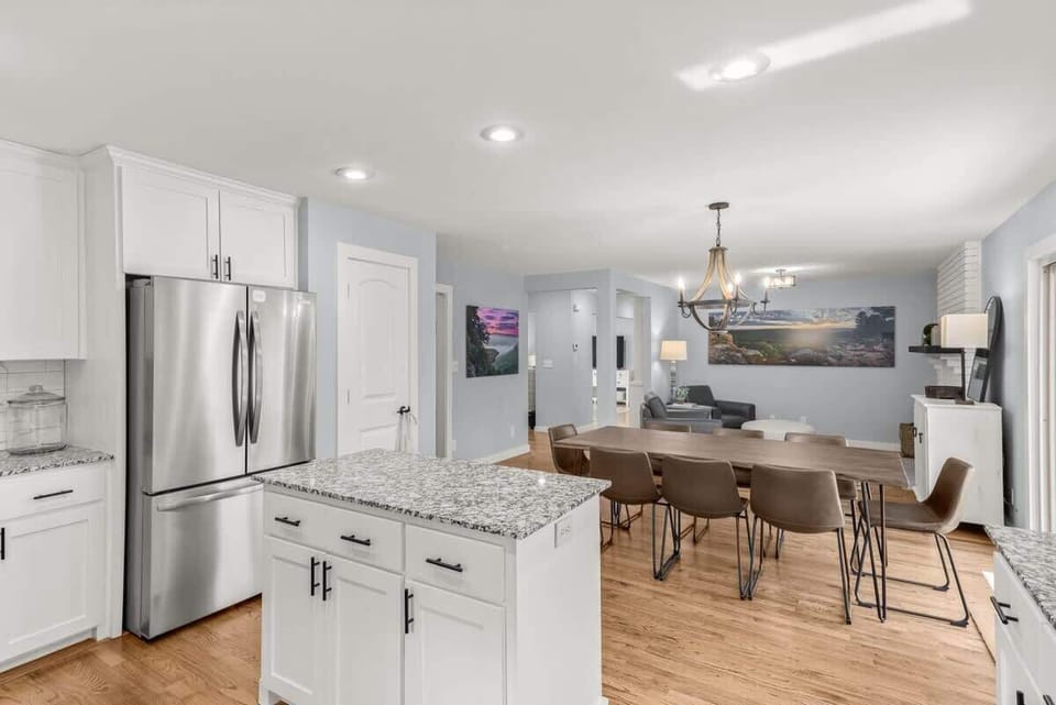 A chic and contemporary area with these white cabinetry.