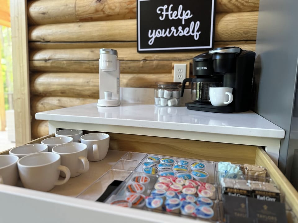 Enjoy the fully stocked coffee bar with coffee (hot & iced), tea & hot chocolate