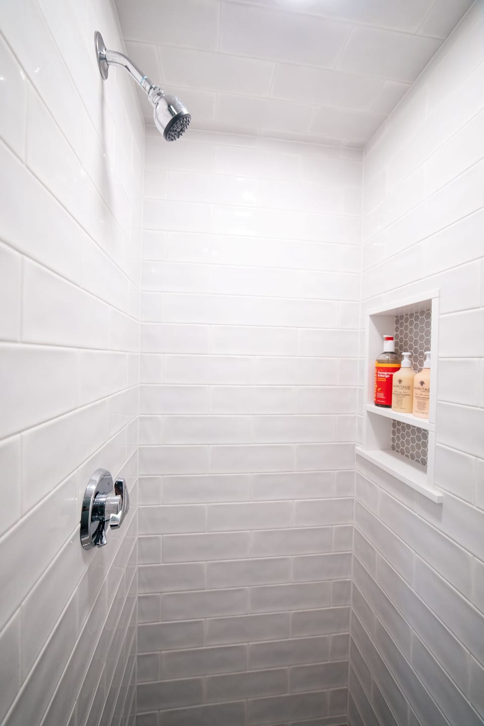 Shower, designer toiletries, hair dryer, towels