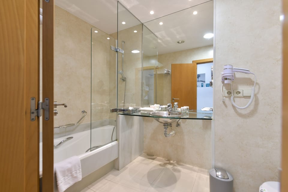 Double Room Single Use, Balcony, Annex Building (Feel Free) | Bathroom | Bathtub, deep soaking tub, hair dryer, towels