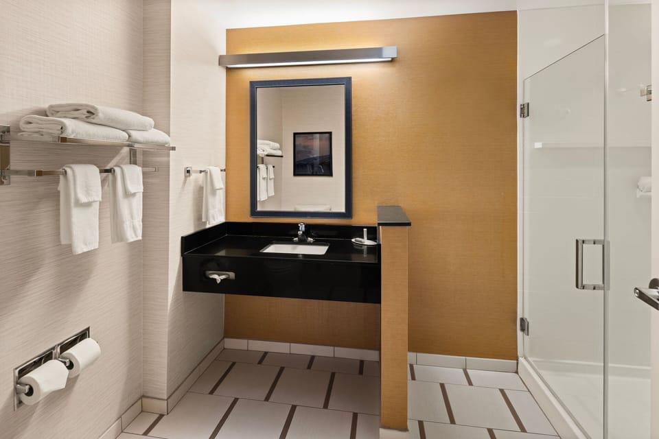 Shower, free toiletries, hair dryer, towels