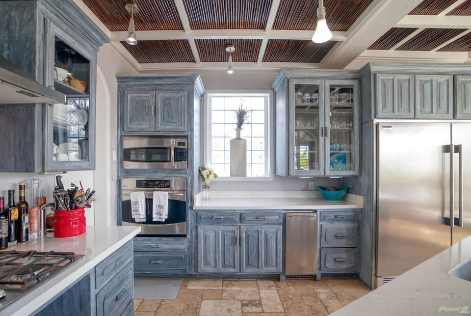 Luxury Villa | Private kitchen | Full-size fridge, microwave, oven, stovetop