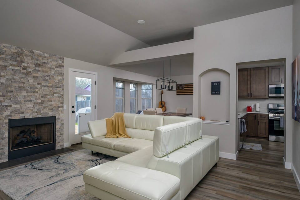 Open space between living, dining and kitchen.