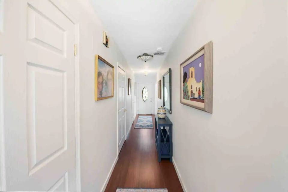 Southwestern art fills the entryway and front hall of Guadalupe House.