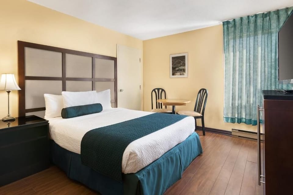 Blackout drapes, iron/ironing board, WiFi (free), bed sheets