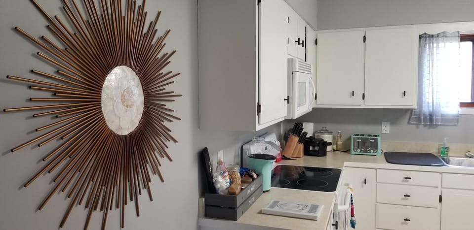 Spacious kitchen with island seating for four