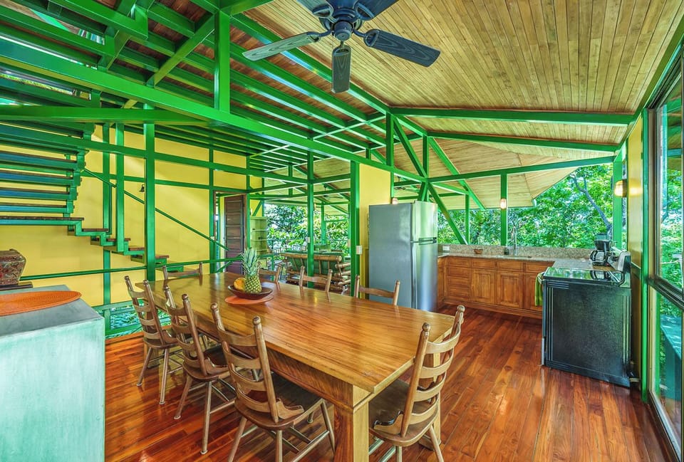 Spacious dining table and kitchen