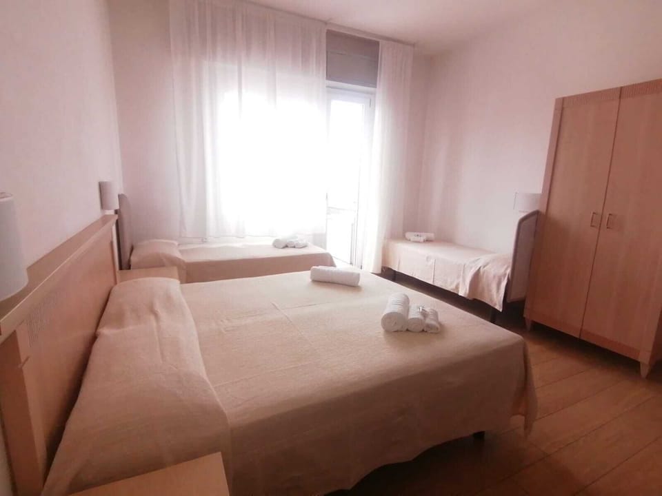 Family Quadruple Room, Sea View | In-room safe, free WiFi, bed sheets