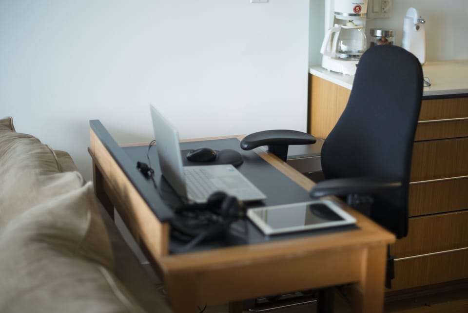 Work station facing west for a city skyline view.