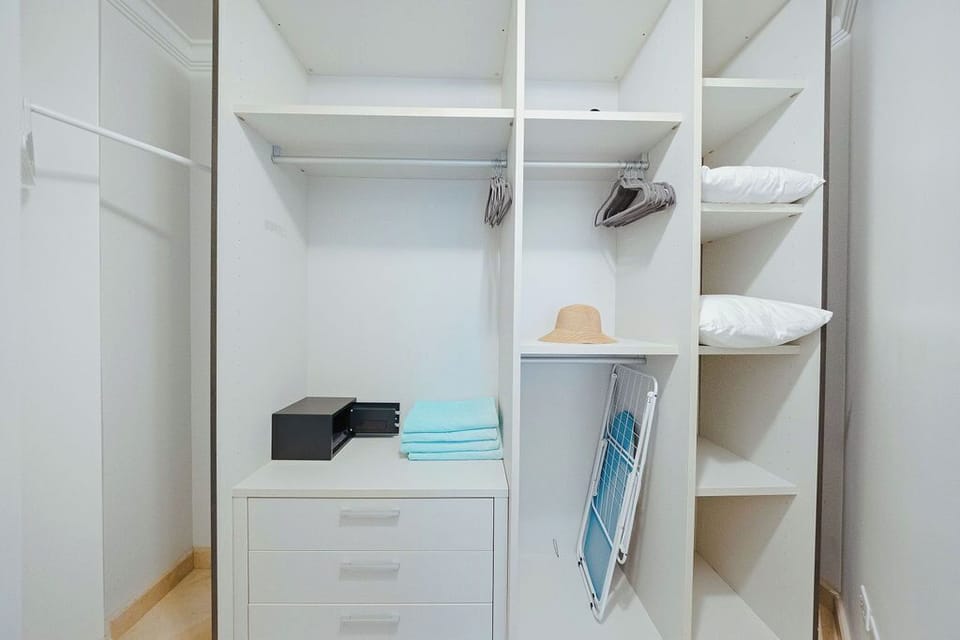 There is enough storage and an open closet to keep your things organized.
