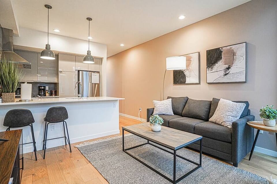 Cozy living area with a sofa and 55 inch TV