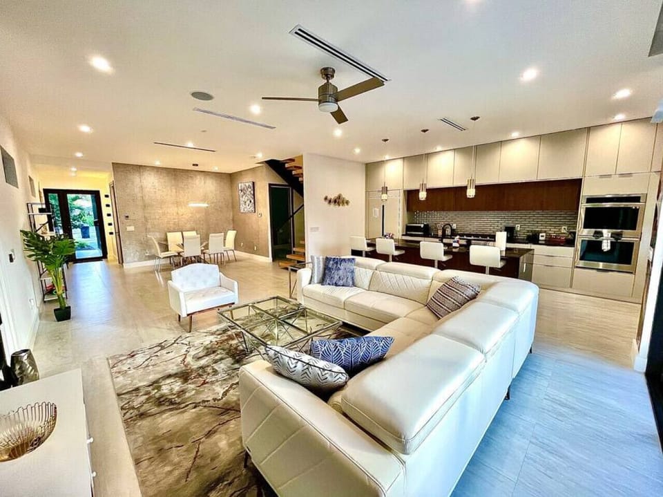 Living room with kitchen in the background