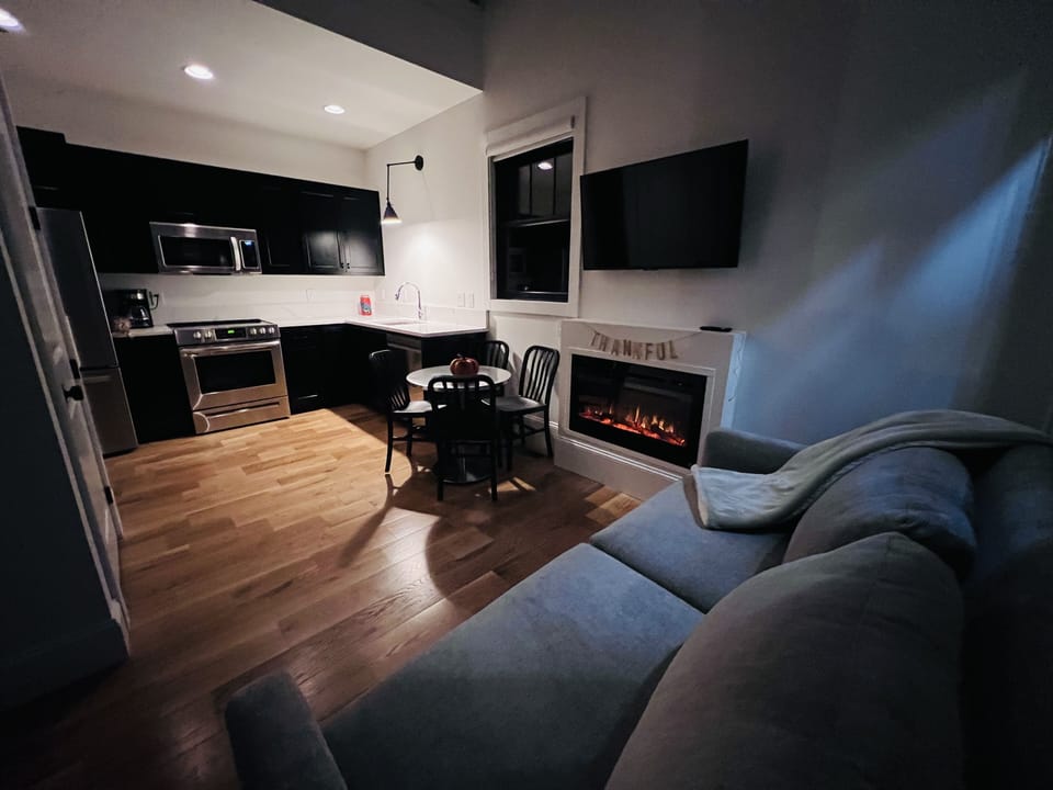 Sit by the cozy electric fireplace!