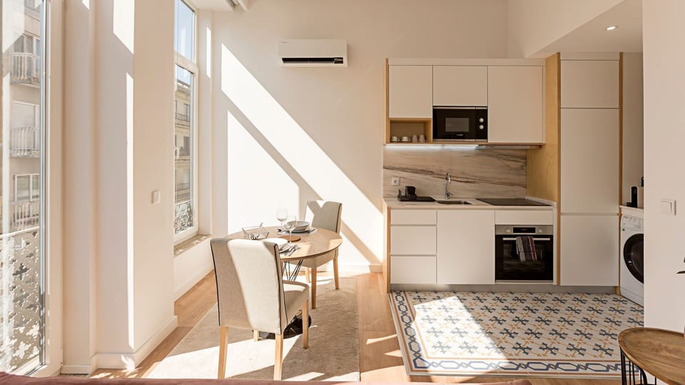 Prepare delightful meals in the well-appointed kitchen, where natural light floods the dining area, inviting you to share memorable moments over delicious food. The spacious layout and modern amenities make cooking and dining a true pleasure. #DiningArea 